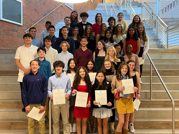 A group of students inducted into the honor society